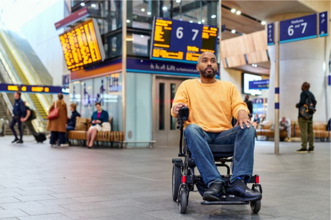 passenger in wheelchair at London Bridge station