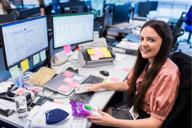 Finance colleague working at desk