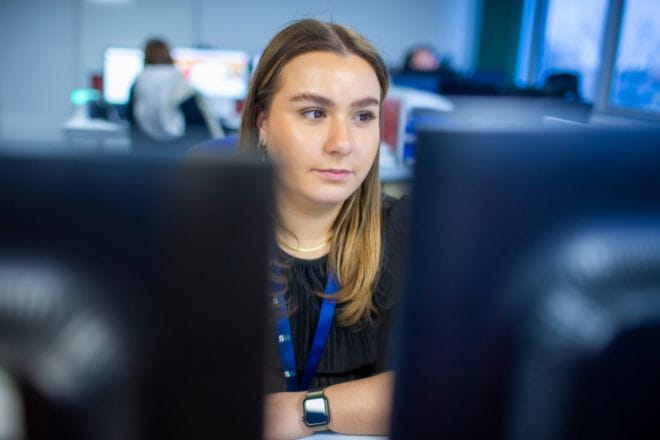 Southeastern colleague at her desk